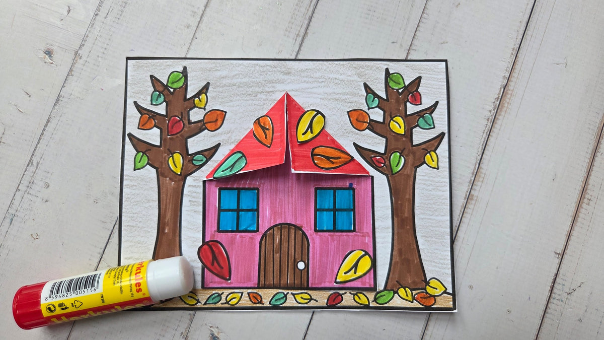 Autumn house paper craft – finished pink house with 3D roof, trees and falling leaves