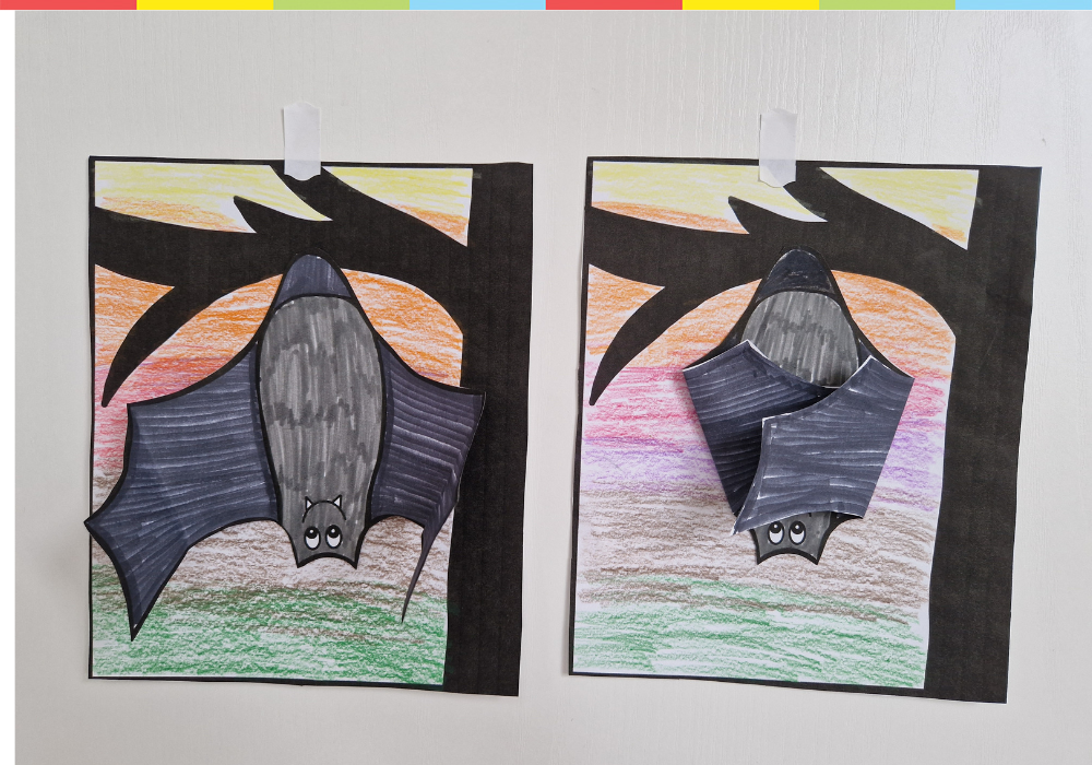 Bats hanging upside down on a tree branch – printable Halloween paper craft template
